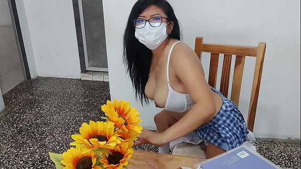 A fake student in a sexy short skirt masturbates at home with a dildo her tits look inflated 