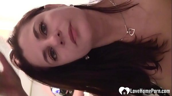 Hot brunette shows her big tits on_camera