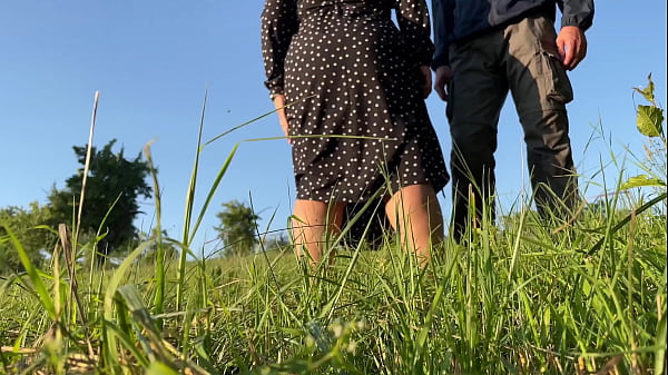 Play MP4 - Sexy MILF with a huge ass in a dress bends over deeply so you can see her pissing in nature