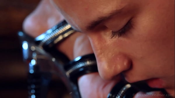 Latex mistress stiletto feet_worship and hardstrapon fucking.