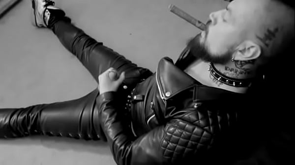ALeather  leather geezer smoking  cigar and  masterbates with spunk 
