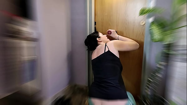 Humiliated Wife Sucking Cock Thru Glory Hole thumbnail