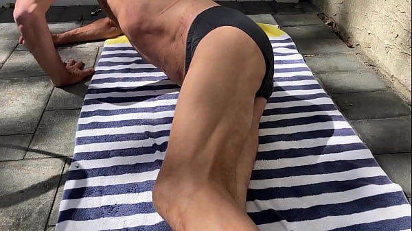 Laying in the sun on striped towel TRAILER 