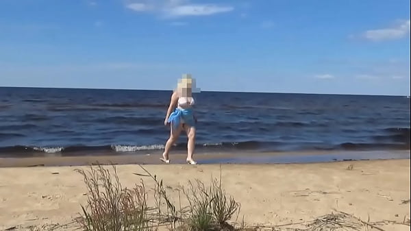 Hot mom on the beach in white swimsuit 