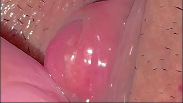 A virgin'_s cute pink clitoris.