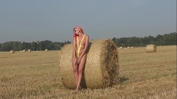 Yellow_slingshot bikini on the_field