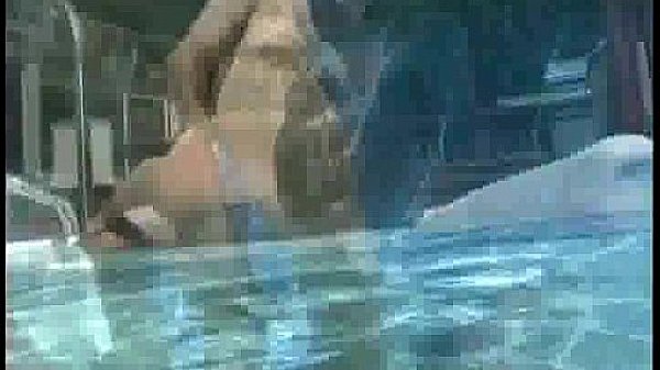 Brunette babe gets fucked and sucks cock in a pool 