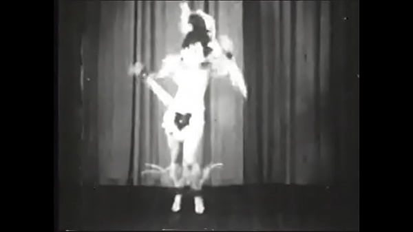 Retro whore performing strip dance on stage