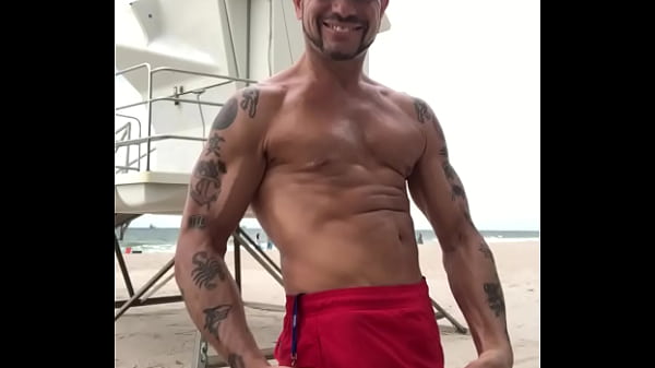 FLEXING AT BEACH