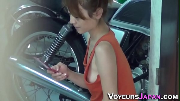 Asian teen filmed outside