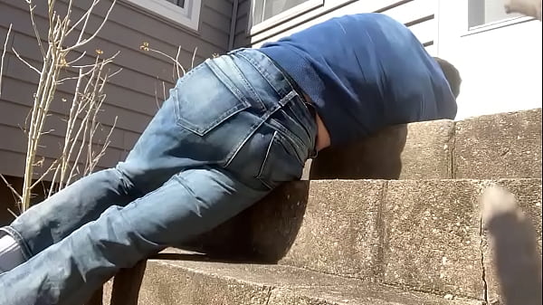 Mayofascial stretch of leg and side on cement steps 