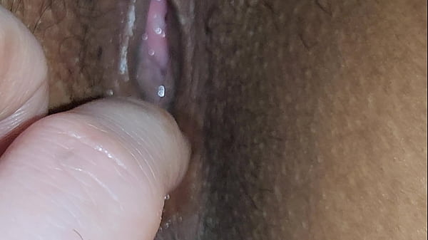 Playing with my vibrator while watching tv squeezing my hubby's dick