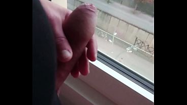 Jerk off at the hotel window