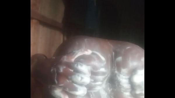 Spycam recorded some naughty African guy masturbating and shooting_big loadbefore_shower