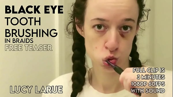 Black eye tooth brushing in braids 
