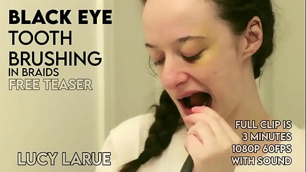 Black eye tooth brushing in braids 