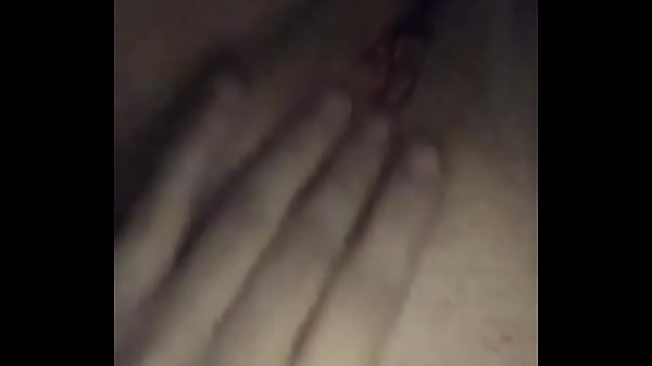 Laying on my bed playing 