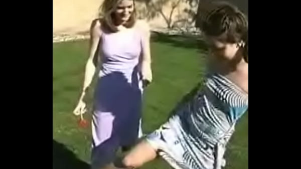 Sissy and cassondra loving each other in the backyard