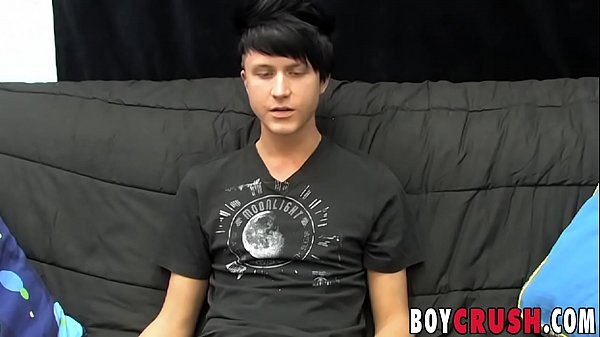 Young gay man jerks off his giant dick during an interview