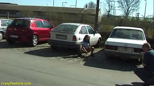 Young Girl Pissing On Street thumbnail
