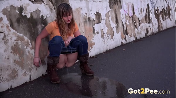 Got2pee Brings Another Desperately Peeing Girl In Rustic Wall - Featuring Big Puddle thumbnail