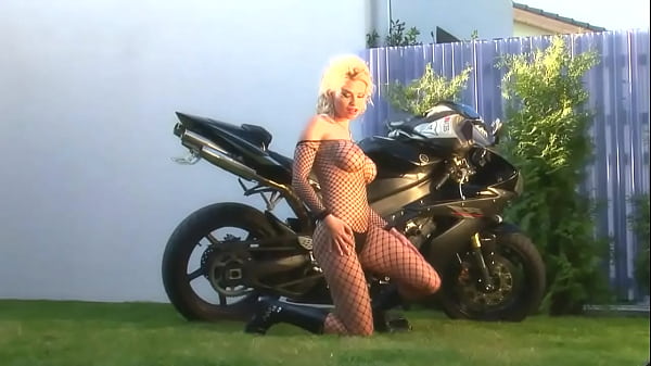 Blonde Bombshell Caylian Curtis Is A Biker's Dream In Fishnet Solo Scene 