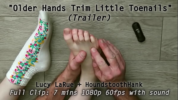 Older hands trim little toenails