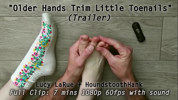 Older hands trim little toenails 