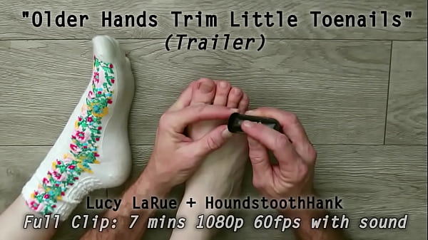 Older hands trim little toenails 