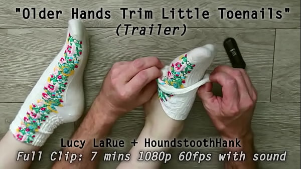 Older hands trim little toenails
