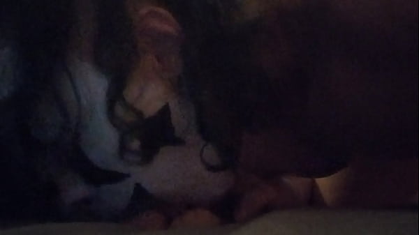 deep throating a dildo with clown makeup on