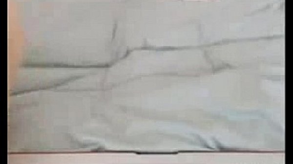 Brunette seductively strokes her pretty pussy 