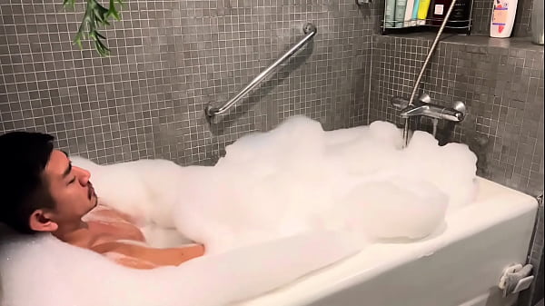 Asian doing yoga and taking a shower 