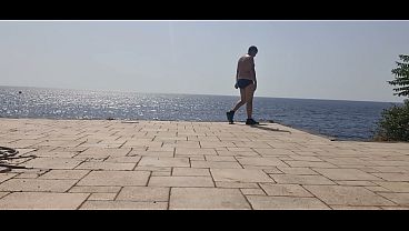 Naked in front of the sea