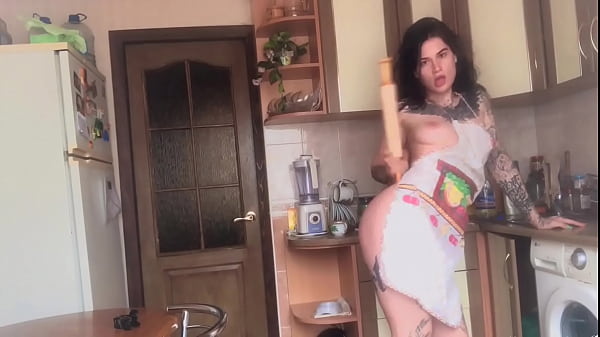 Tattoed babe fingering and fucking pussy in the kitchen