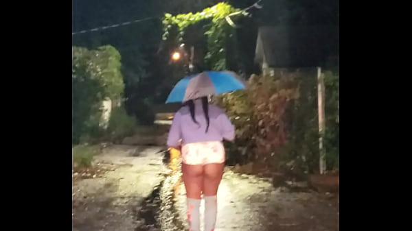 THIGH HIGH STILETTO BOOTS_BOOTY SHORTS WALKING IN_THE RAIN