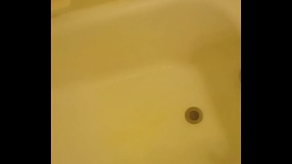 Urinating unto the bathtub 