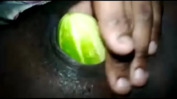 Jenny masturbates with cucumber