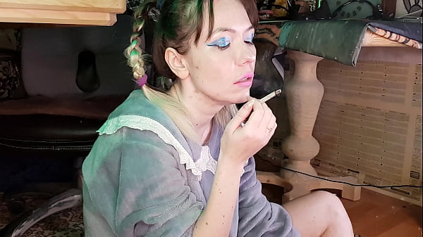 youngmom smokes a cigarette