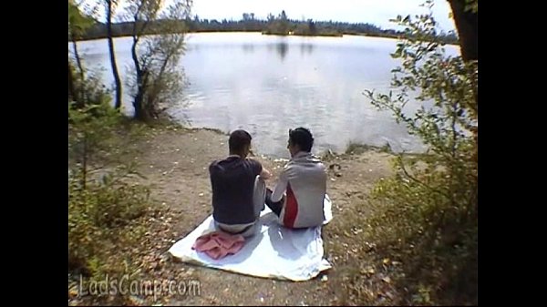 Play MP4 - Two buddies go down on each other on a river bank
