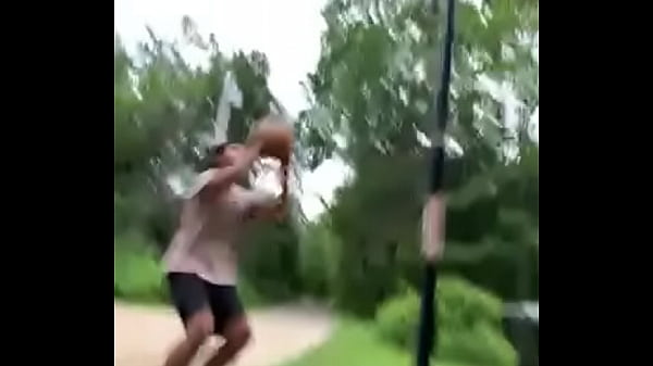 Sexy Small black man dunks on 20ft hoop