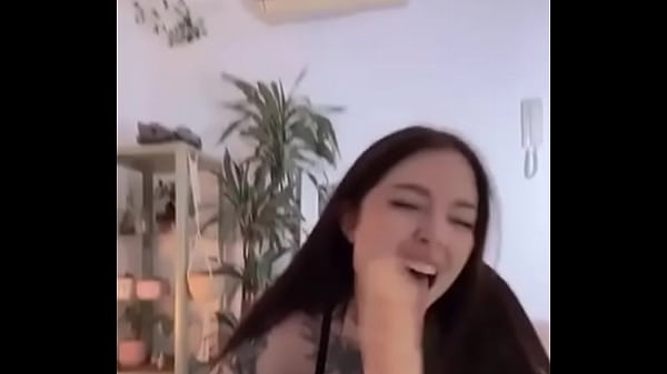 Tattooed girl sucks and jacks off dildo 