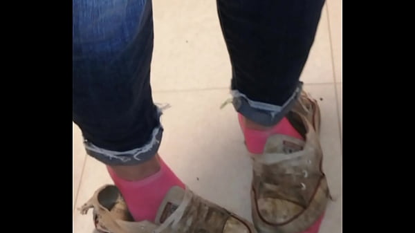 Trashed sneakers and jeans 