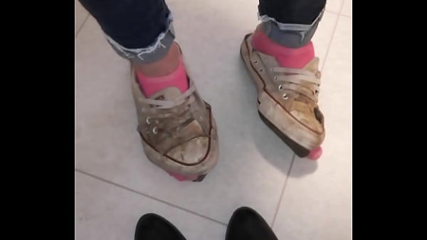 Trashed sneakers and jeans 