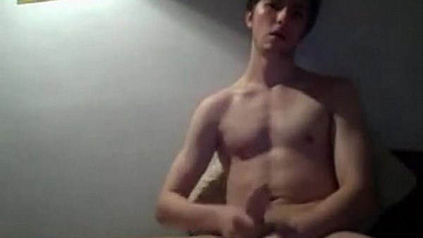 Jock masturbates and cums on himself 