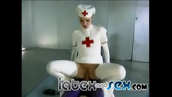 Latex nurses treat a rubber gas mask guy 