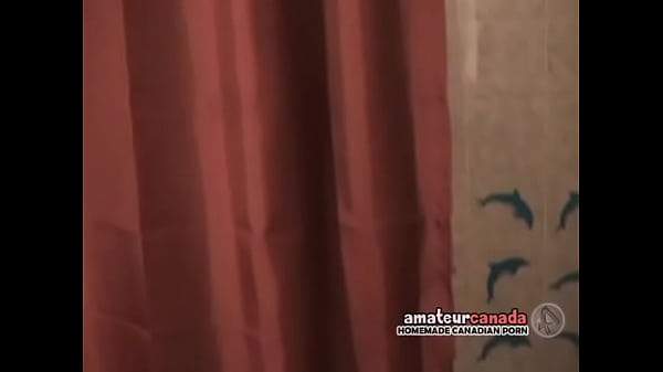 Watching naked redhead in shower smiling 