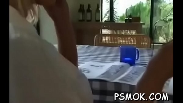 Breasty babe smokin' naked 