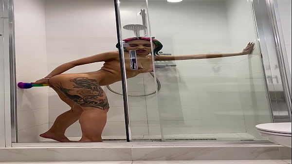 Naked Roxy showers and Masturbates
