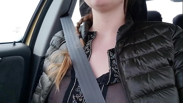 Daring babe in public with a see through shirt 